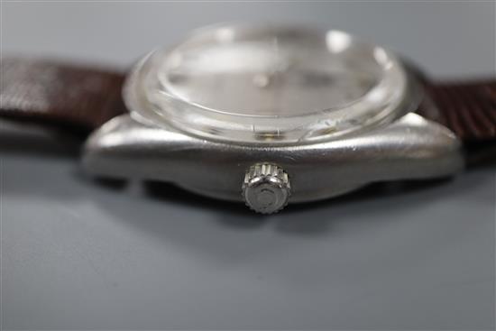 A gentlemans stainless steel Omega Seamaster automatic wrist watch, on associated lizard strap.